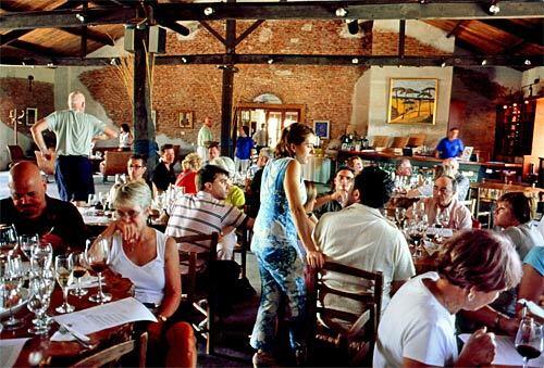 Guests fill the tasting room at Juanicó Winery, a 180-year old family business in the village of Juanicó that boasts award-winning vintages. It's one of 15 stops along Uruguay's Wine Roads.