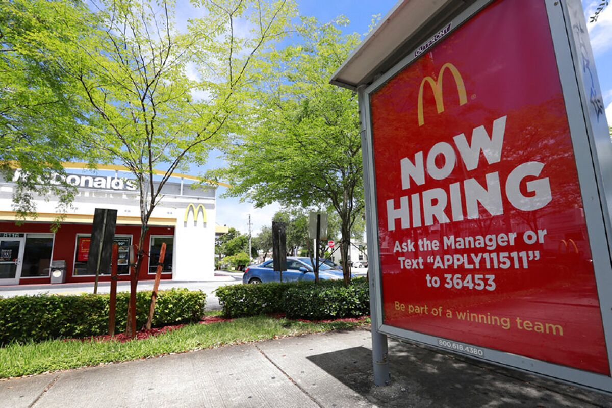 A hiring sign at a McDonald's restaurant.