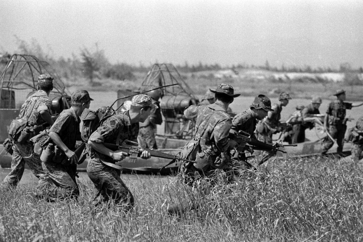 In 1972, South Korean soldiers in Vietnam advance during an assault on an enemy position near Nha Trang.