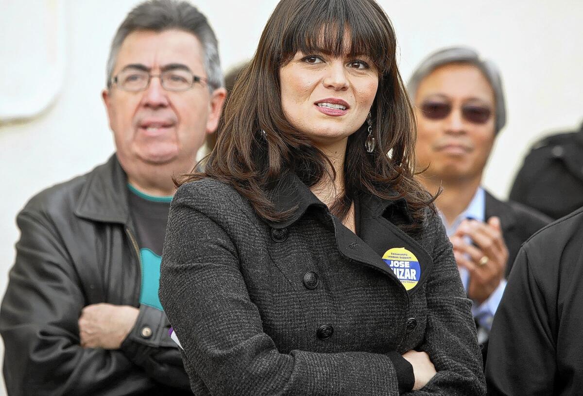 Francine Godoy, shown at a campaign kickoff for Councilman Jose Huizar in 2010, had accused Huizar, her boss, of retaliating against her after she refused to provide him with "sexual favors." The suit has been settled.