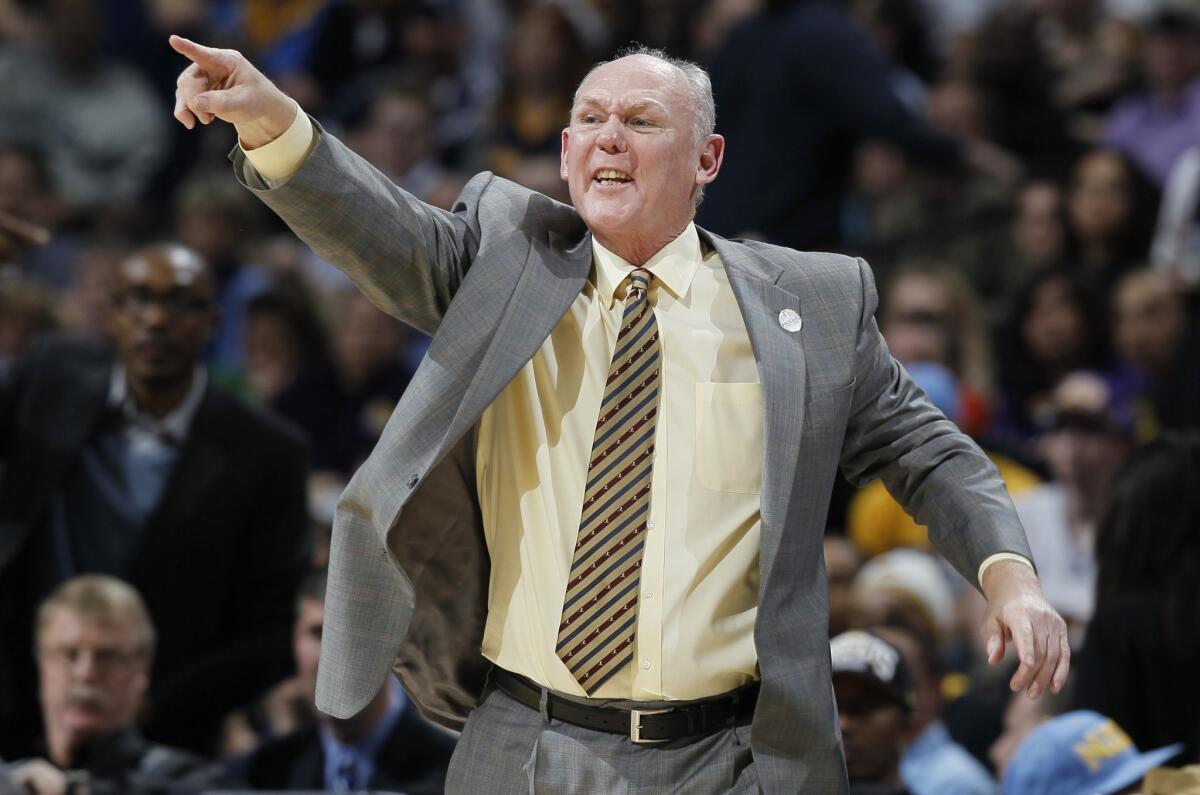 George Karl, shown with the Denver Nuggets in 2013, has agreed to become the head coach of the Sacramento Kings.