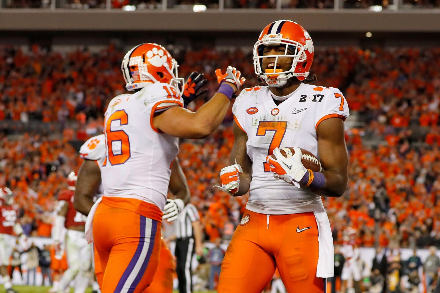 Clemson receiver Mike Williams (7) celebrates with tight end Jordan Leggett (16) after scoring a four-yard touchdown during the fourth quarter.