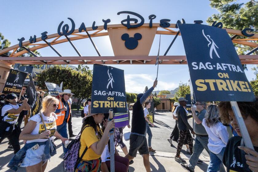 BURBANK, CA - NOVEMBER 01: SAG-AFTRA shut down all other picket locations for one massive "Unity Picket" on strike day 111 at Walt Disney Studios on Wednesday, Nov. 1, 2023 in Burbank, CA. (Myung J. Chun / Los Angeles Times)