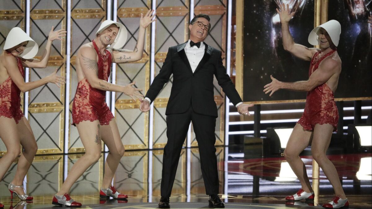 Host Stephen Colbert leads a dance number during the 69th Emmy Awards.