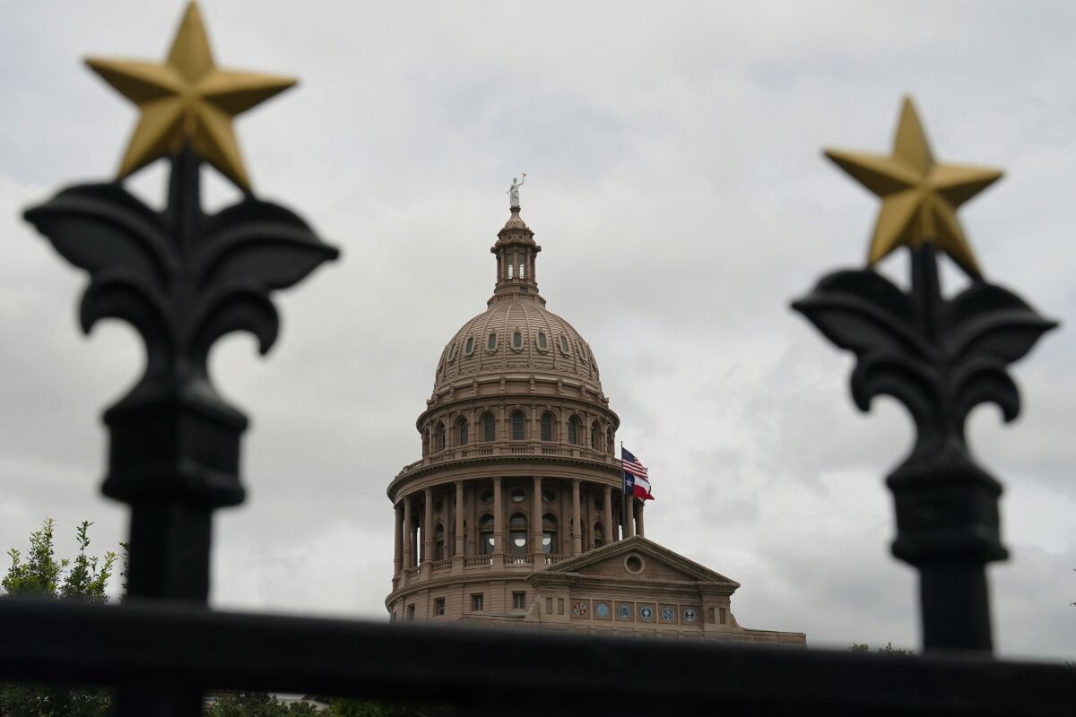 FILE - This June 1, 2021, file photo shows the State Capitol in Austin, Texas. Texas Republicans approved on Monday, Oct. 18 redrawn U.S. House maps that favor incumbents and decrease political representation for growing minority communities, even as Latinos drive much of the growth in the nation’s largest red state. (AP Photo/Eric Gay, File)