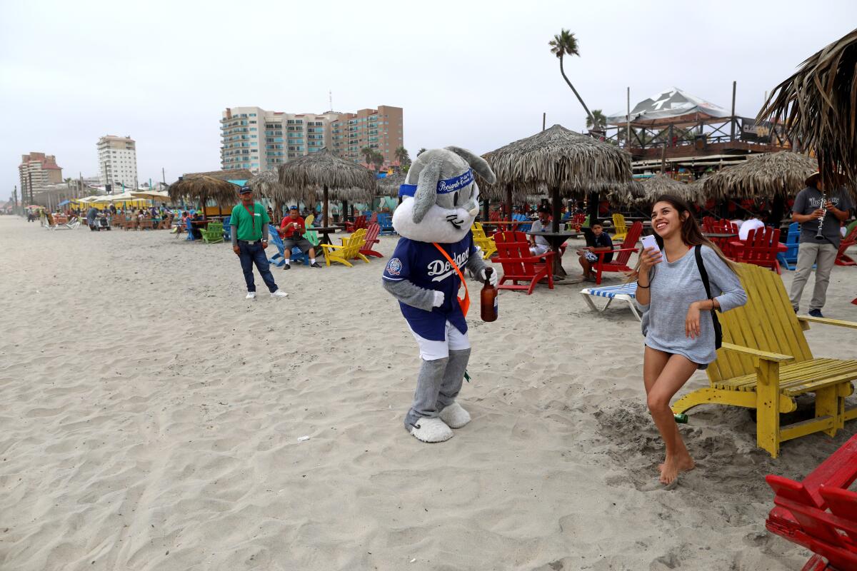 Yared Silva of Montclair dances on the beach while on vacation in Rosarito, Mexico.
