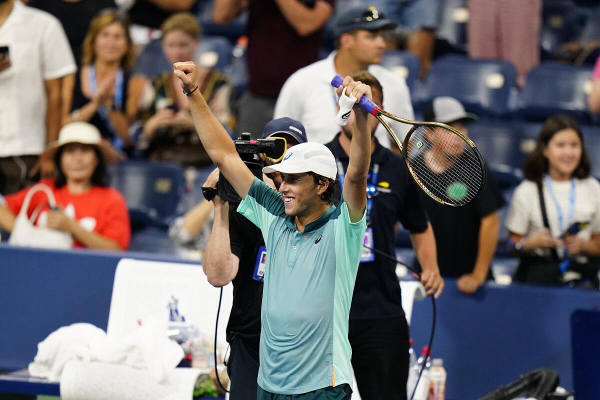 Brandon Holt reacts after defeating Taylor Fritz in an opening-round match Aug. 29 at the U.S. Open in New York.