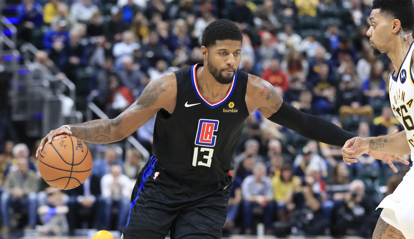 INDIANAPOLIS, INDIANA - DECEMBER 09: Paul George #13 of the Los Angeles Clippers dribbles the ball against the Indiana Pacers at Bankers Life Fieldhouse on December 09, 2019 in Indianapolis, Indiana. NOTE TO USER: User expressly acknowledges and agrees that, by downloading and or using this photograph, User is consenting to the terms and conditions of the Getty Images License Agreement. (Photo by Andy Lyons/Getty Images)