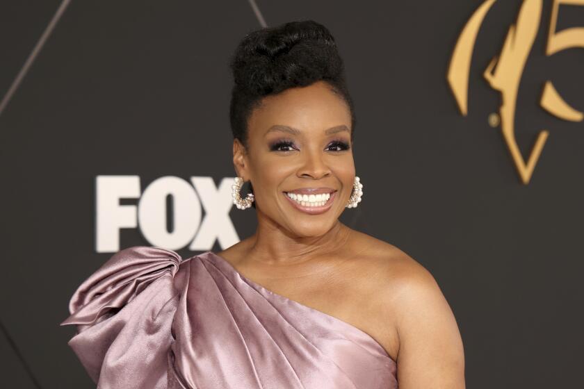 Amber Ruffin walks the red carpet at the 75th Emmy Awards on Monday, Jan. 15, 2024 at the Peacock Theater in Los Angeles. (Photo by Mark Von Holden/Invision for the Television Academy/AP Images)
