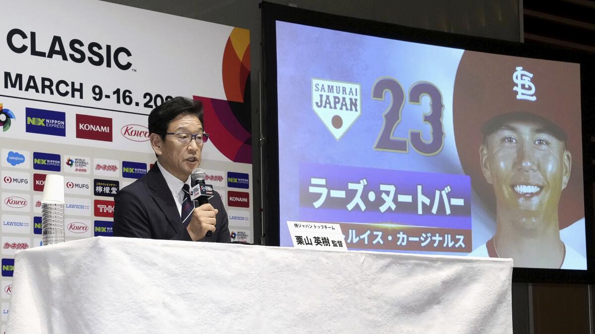 Team Japan outfielders Lars Nootbaar and Masataka Yoshida meet up