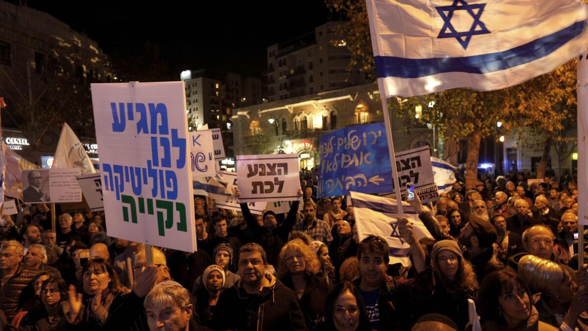 Israelis protest at a right-wing demonstration against corruption in Jerusalem on Saturday.