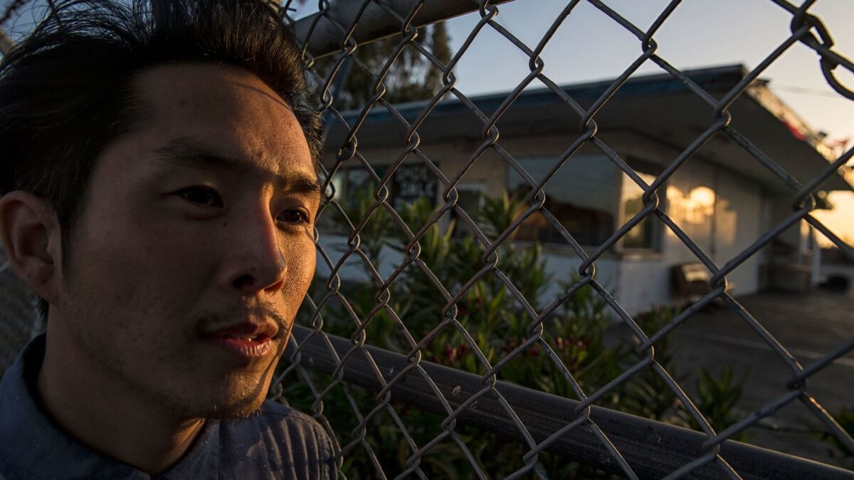 Justin Chon at one of the sites along Van Ness Avenue where he filmed the movie "Gook," about the Korean American experience in the L.A. riots of 1992.