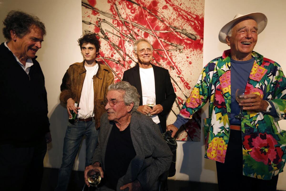 Celebrating Ed Moses' birthday at William Turner Gallery on Thursday were, from left, Tony Berlant, Pietro Alexander, his father Peter Alexander, seated, Charles Arnoldi and Billy Al Bengston.
