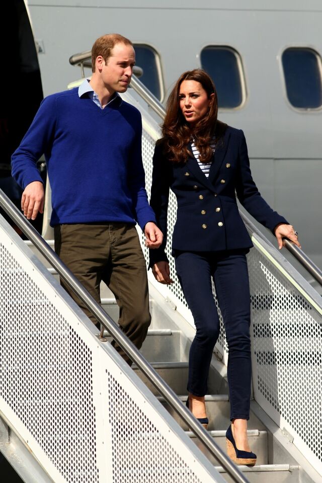 Prince William and Duchess Catherine arrive at the Whenuapai base in Auckland on April 11.