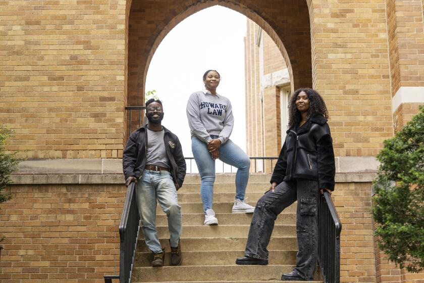 Awa Nyambi, 25, left, Alyssa Whitaker, 25, and Kenadi Mitchell, 24, law students at Howard University School of Law, pose for a portrait, Friday, April 19, 2024, in Washington. The students are part of a group of young Black lawyers working to protect voting rights during the 2024 election. (AP Photo/Jacquelyn Martin)