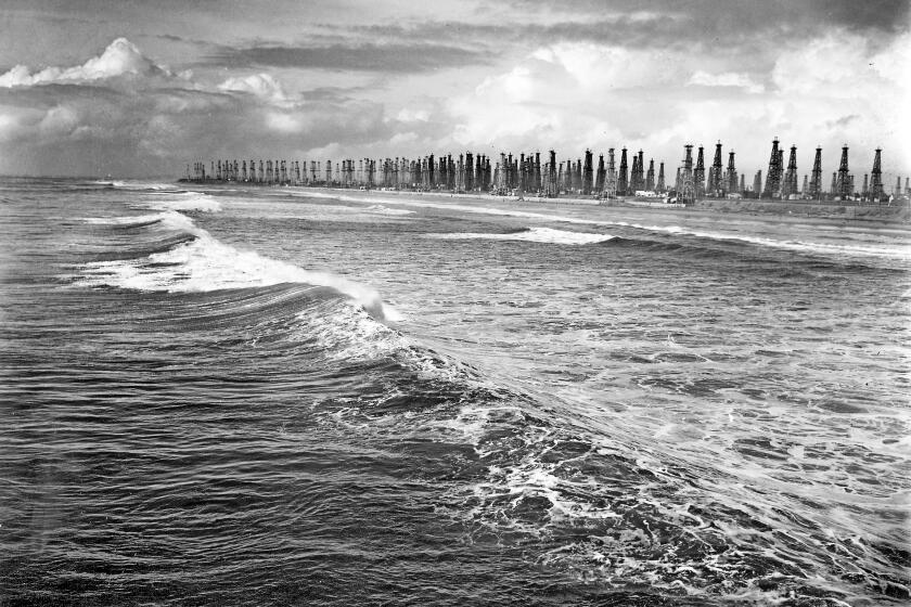 Jan. 28, 1940: The Huntington Beach coastline in 1940 was a forest of oil derricks. Oil discoveries in Huntington Beach, Long Beach and Santa Fe Springs in 1920 and 1921 drove massive drilling.