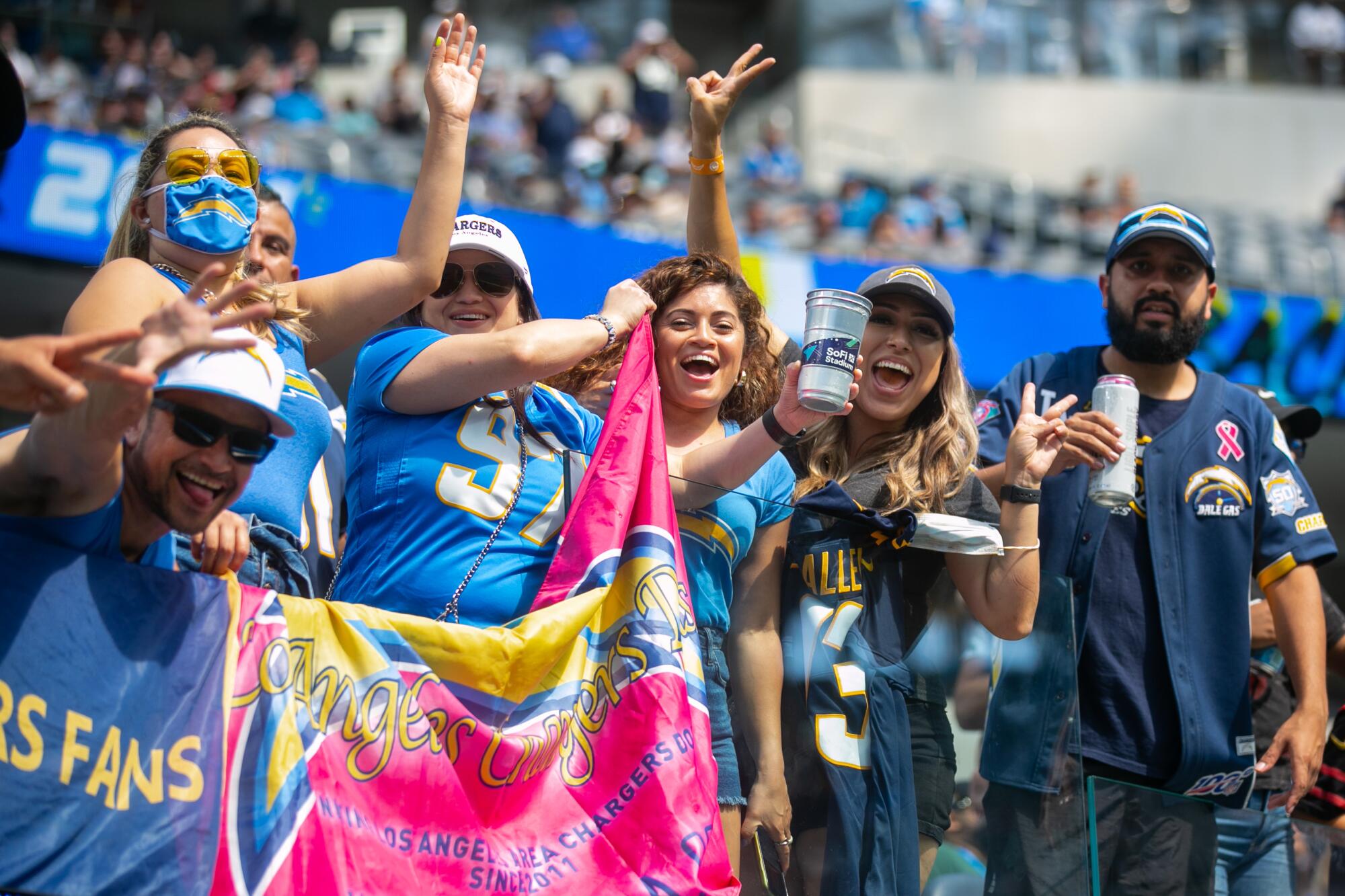 Fans enjoy a day at SoFi Stadium for the Chargers Fan Fest and open practice.