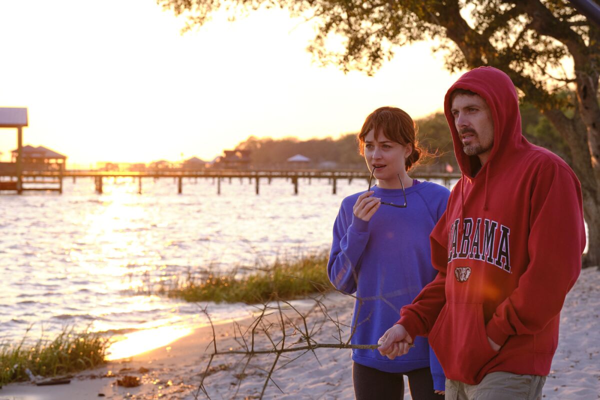 Dakota Johnson and Casey Affleck in the movie "Our Friend."
