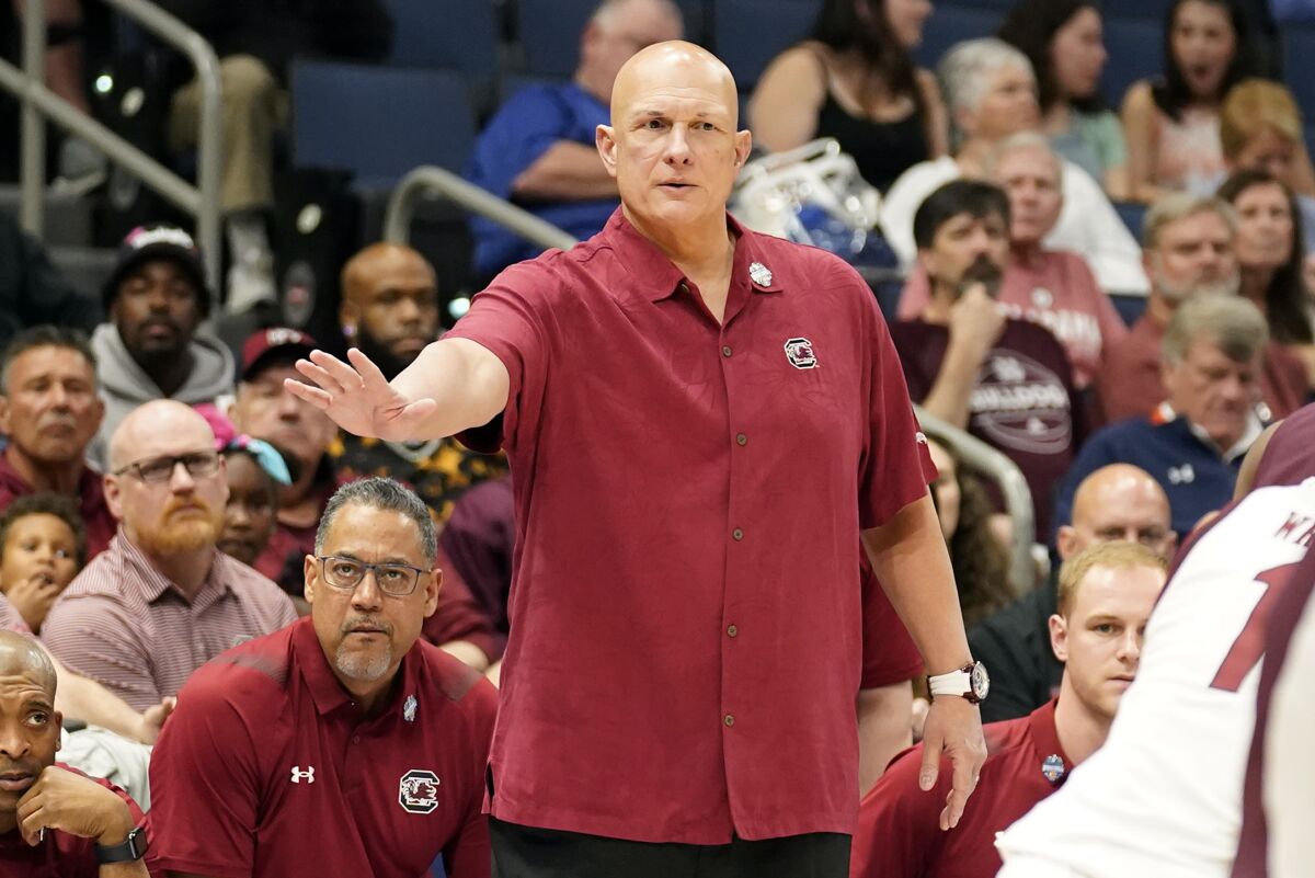South Carolina head coach Frank Martin directs his players against Mississippi State during the first half of an NCAA men's college basketball game at the Southeastern Conference tournament in Tampa, Fla., Thursday, March 10, 2022. (AP Photo/Chris O'Meara)