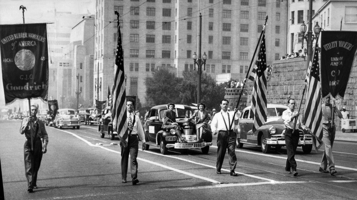 Sept. 6, 1948: The American Federation of Labor Color Guard leads the Labor Day parade on Spring Street in front of Los Angeles City Hall in 1948.