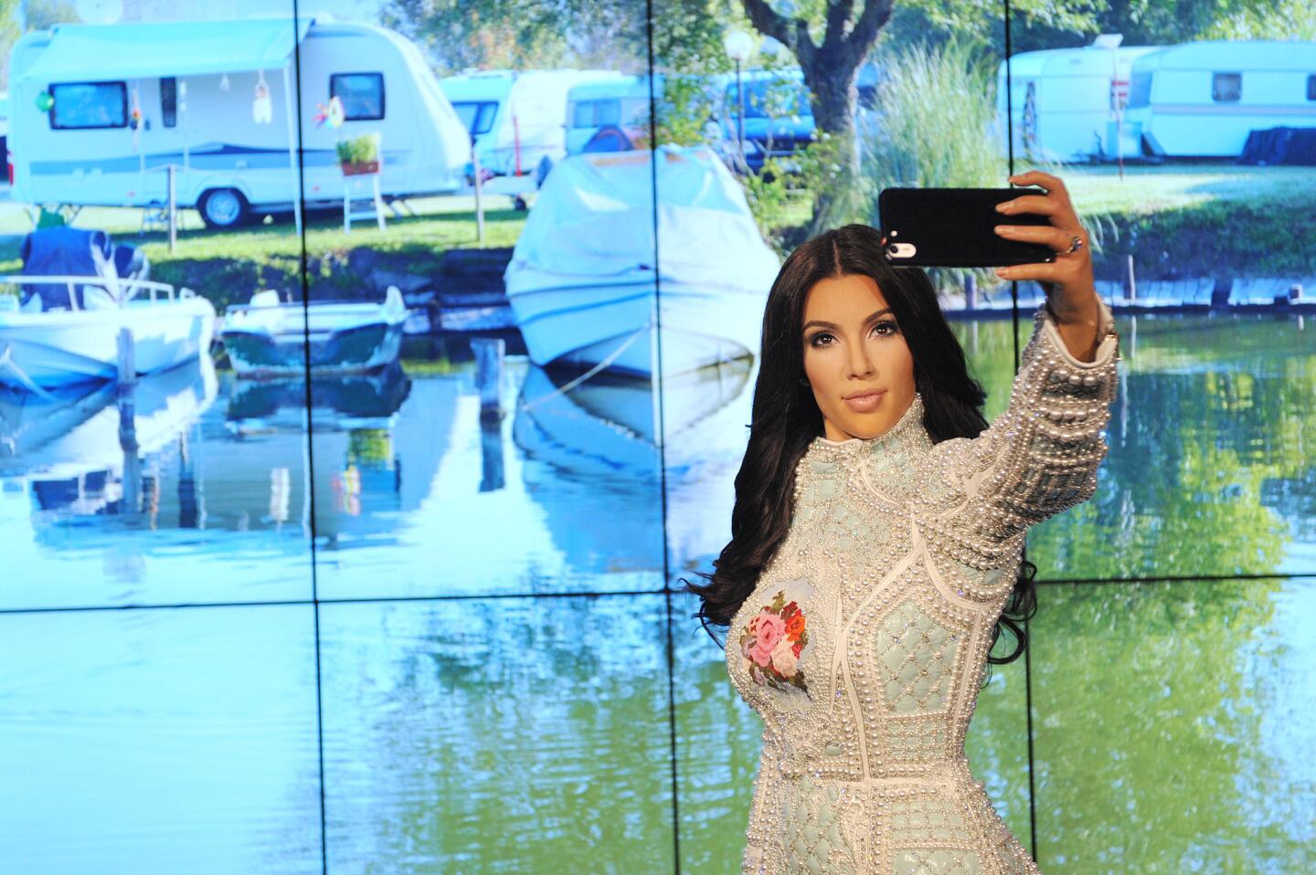 This counts, right? To commemorate Kim Kardashian's love of the selfie, Madame Tussauds in London unveiled a new wax figure of the reality star taking selfies against an ever-changing backdrop of different locations.