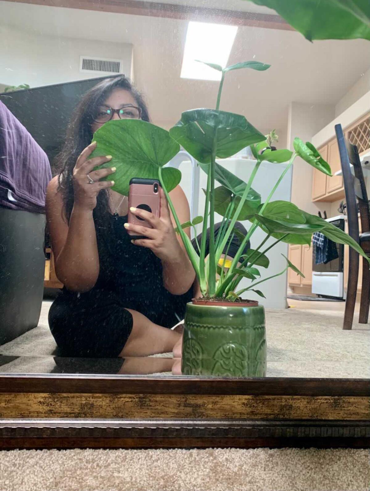 Reader Irene Pineda with a monstera