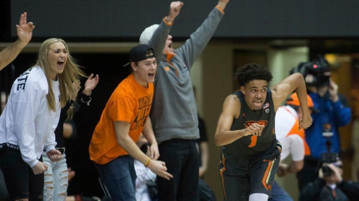 Oregon State fans react after Stephen Thompson Jr. (1) made a shot during the second half on Feb. 19.