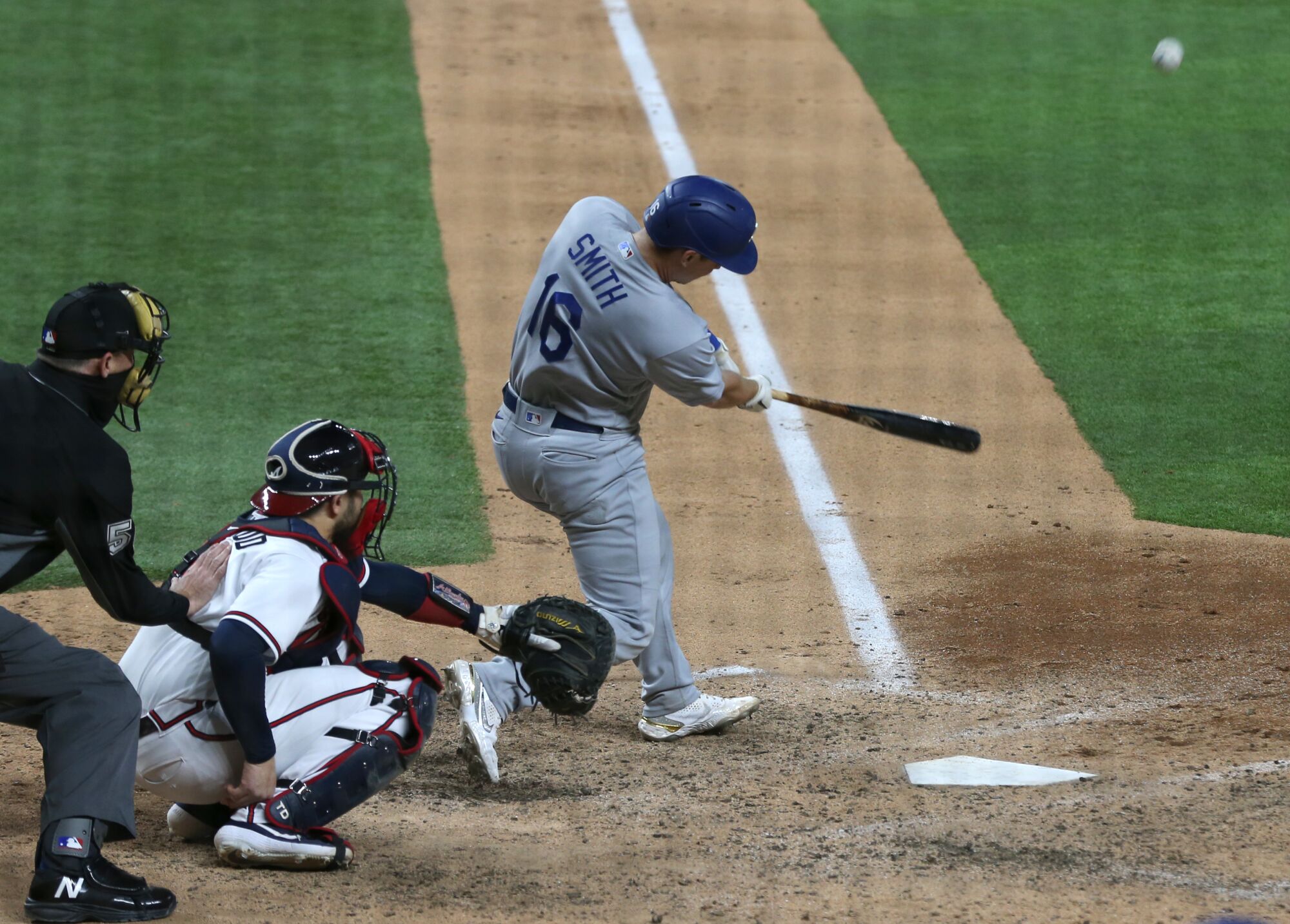 Dodgers catcher Will Smith hits a three-run home run in the sixth inning.
