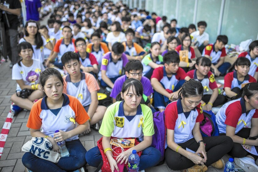 Students and pro-democracy activists attend a lecture near Tamar Park in Hong Kong.