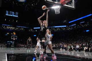 New York Liberty's Breanna Stewart (30) shoots during the first half in Game 2 of a WNBA basketball final playoff series against the Minnesota Lynx, Sunday, Oct. 13, 2024, in New York. (AP Photo/Pamela Smith)