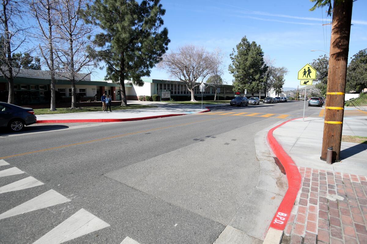 Bump-outs like these in front of Muir Middle School are being built at local schools as part of a program called Safe Routes to School that are expected to channel traffic better.