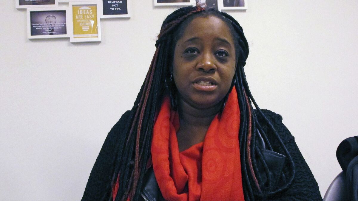 Kiah Morris, a former Vermont state representative, discusses threats and harassment she's faced, during an interview in Bennington, Vt. Morris, who was the first black woman in the Vermont Legislature, has resigned.