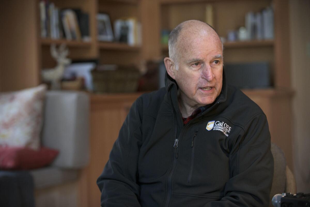 Gov. Jerry Brown, at his Colusa County home on Saturday, said a ballot measure to raise commercial property taxes could struggle in 2020.