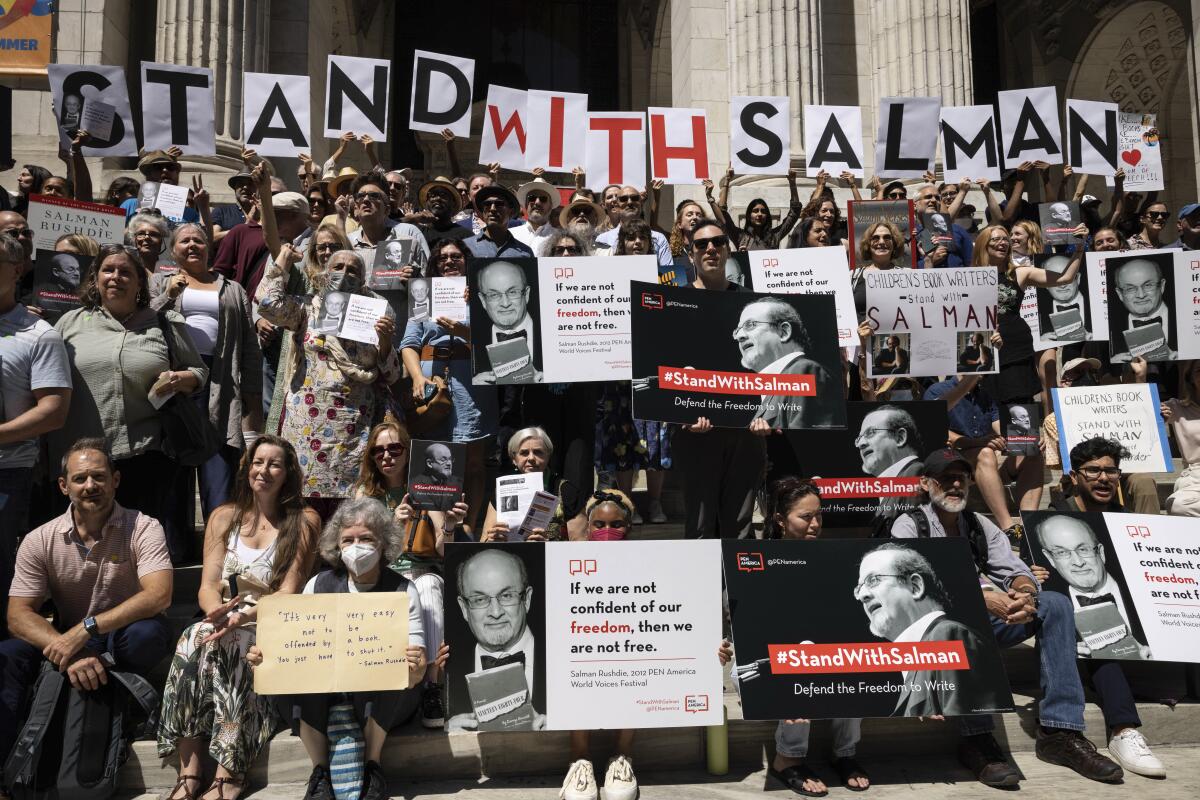 A group of writers and supporters of Salman Rushdie.