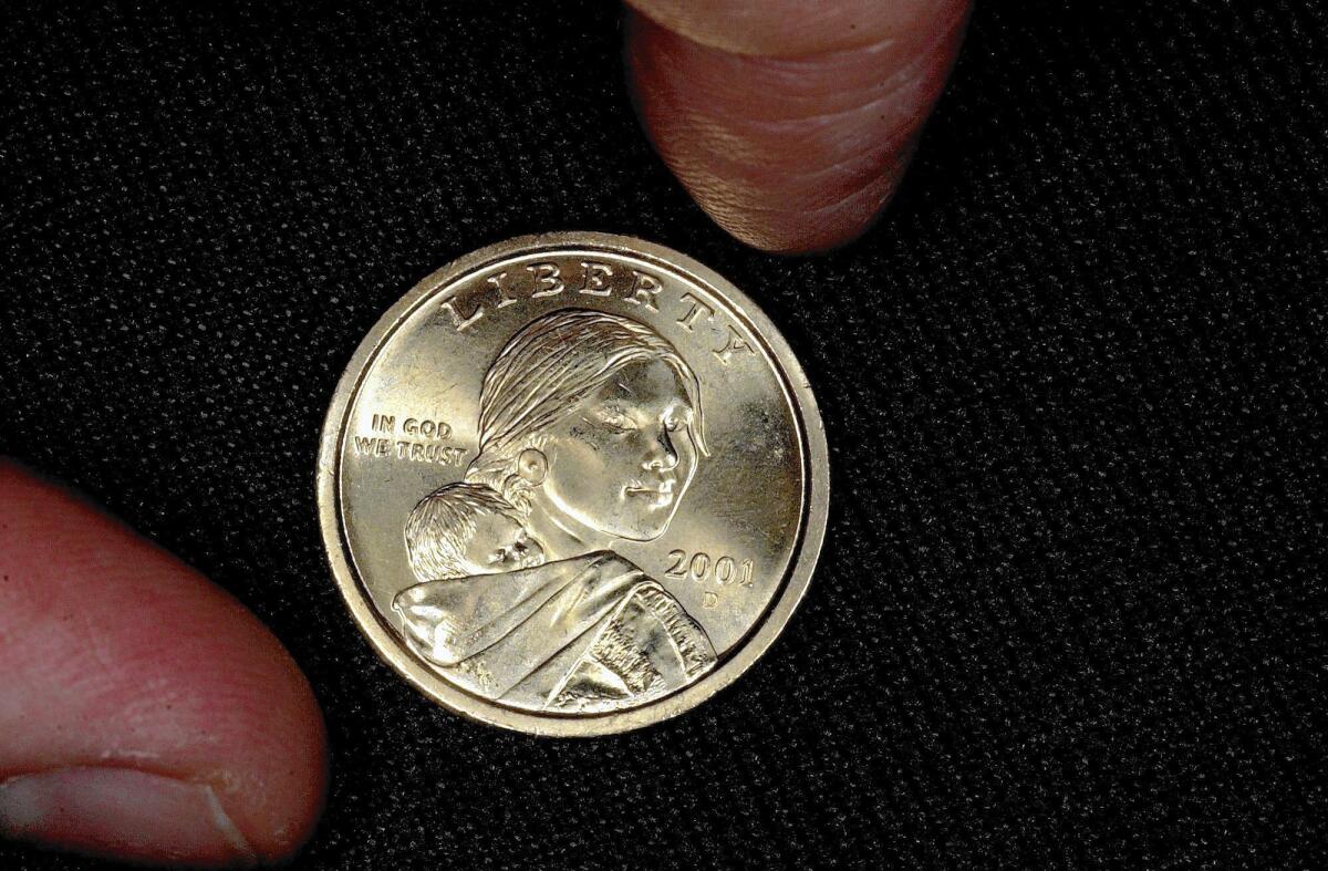 Shoshone guide Sacagawea was selected for the front of the gold dollar coin in a nod to the inclusion of Native Americans and women on the nation’s currency.
