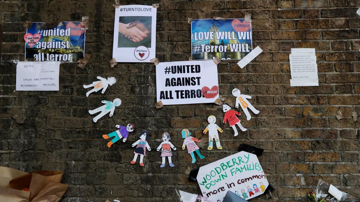 Unity messages are displayed on June 20, 2017, near the scene of a van attack in the Finsbury Park area of North London.