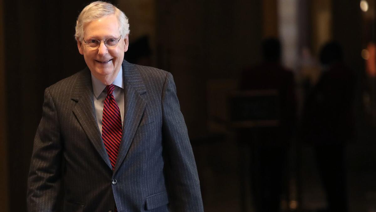 Senate Majority Leader Mitch McConnell walks to the Senate floor on Jan. 31 for a vote on legislation opposing President Trump's intention to withdraw U.S. troops from Afghanistan and Syria.