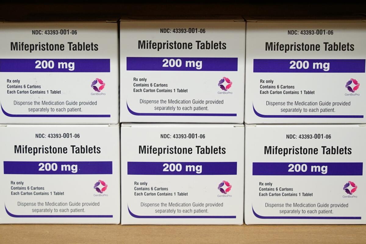 Boxes of the abortion drug mifepristone sit on a shelf 