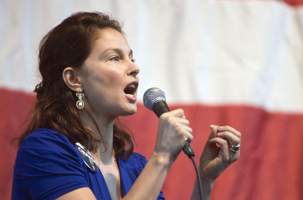 In this Nov. 1, 2008 photo, actress Ashley Judd speaks at a Democratic get-out-the-vote rally in Louisville, Ky. Judd announced Wednesday she won't run for U.S. Senate in Kentucky against Republican Mitch McConnell, saying she had given serious thought to a campaign but decided her responsibilities and energy need to be focused on her family.
