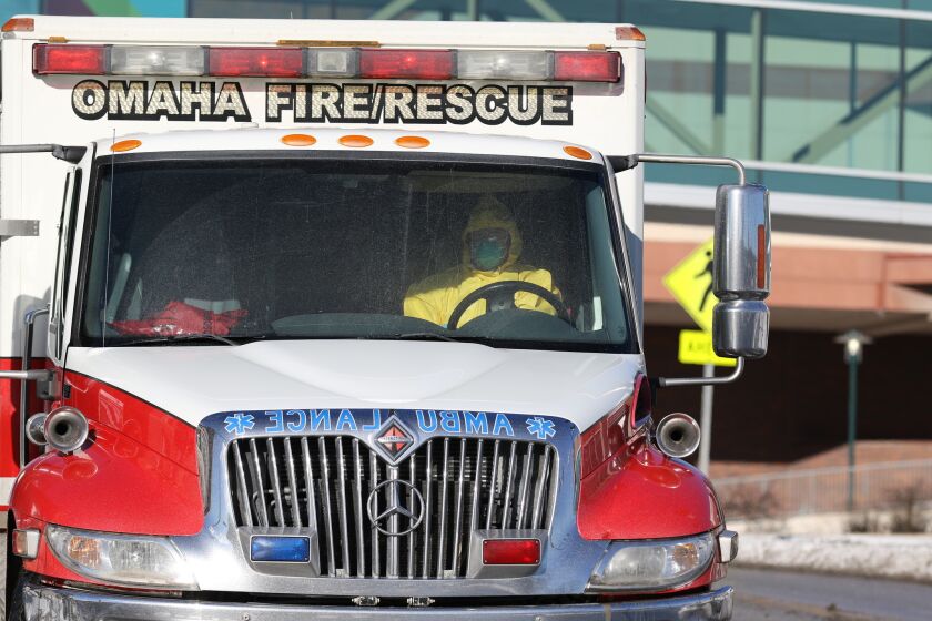 An ambulance driver takes an Ebola-exposed patient to Nebraska Medicine on Jan. 4.