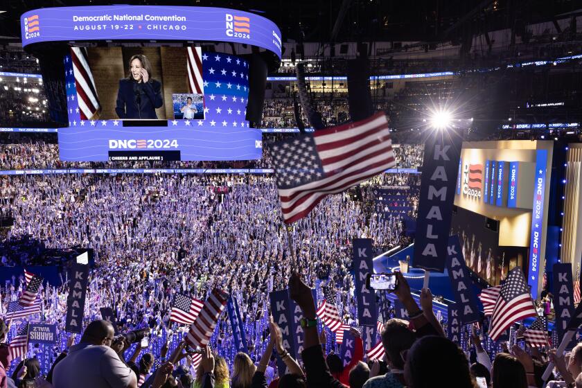 A capacity crowd cheers the nomination of Vice President Kamala Harris at the conclusion of the DNC.