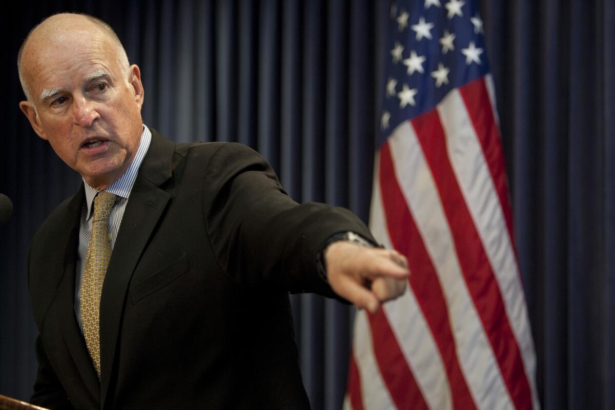 Gov. Jerry Brown discusses California finances during a Capitol news conference on May 13, 2013.