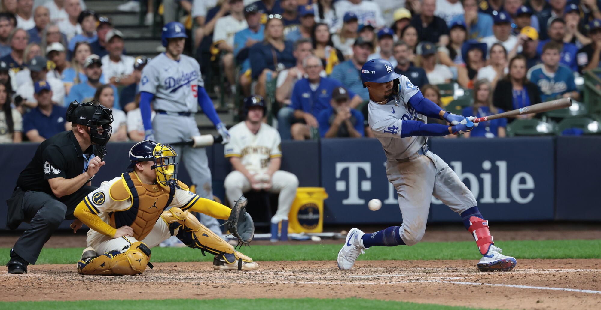 Dodgers shortstop Mookie Betts strikes retired successful the eighth inning during a nonaccomplishment to the Brewers successful Game 2 of the NLCS.