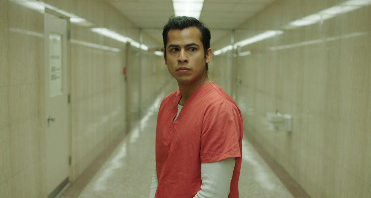 A young man in an automated prison in "Please Hold." 