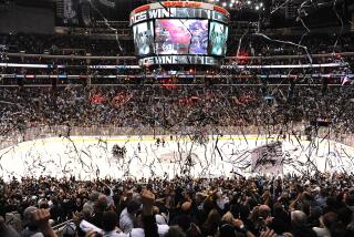 LOS ANGELES, CALIFORNIA JUNE 7, 2014-Kings players celebrate on the ice after defeating the Rangers.