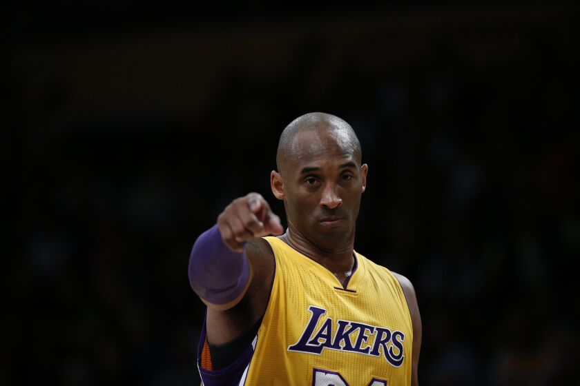 Kobe Bryant directs his teammates during a game against the Timberwolves on Feb. 2.