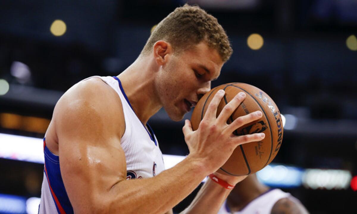 Clippers forward Blake Griffin reacts to being called for a foul during Saturday's win over the Sacramento Kings. A 16th technical foul by Griffin in the Clippers' regular-season finale would not lead to him being suspended for the team's playoff opener.