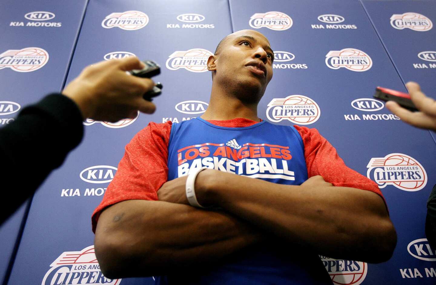Newly acquired small forward Caron Butler is interviewed on the Clippers' first day of practice Friday at their training facility in Playa Vista.