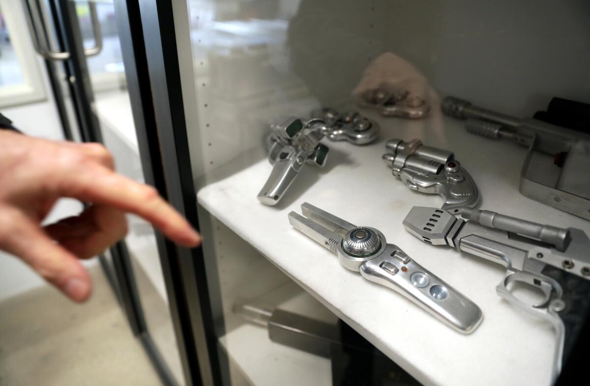 These mock weapons, many of them used as props in the movie “Men in Black,” were carved out of aluminium.