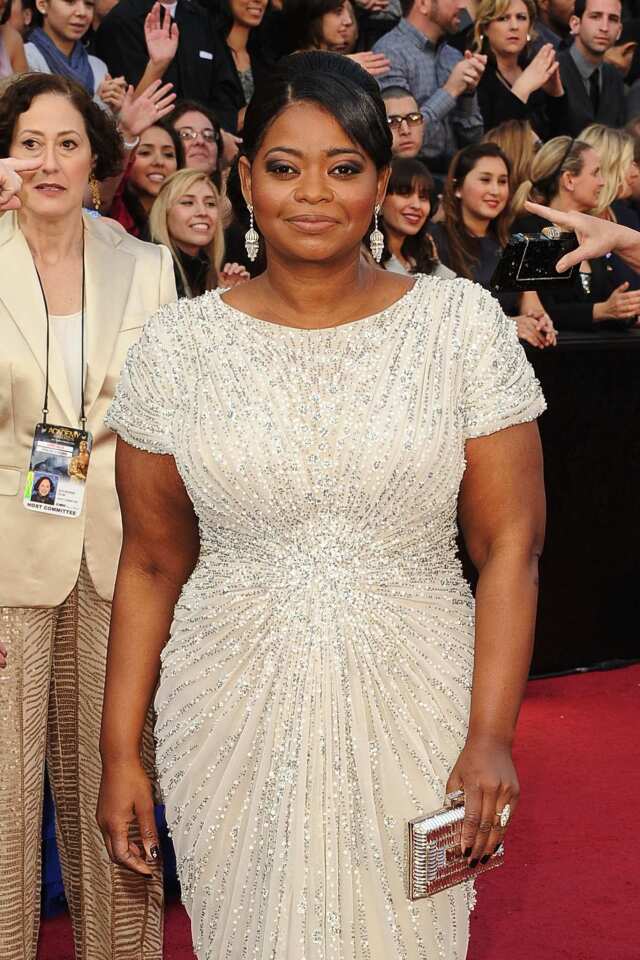 Octavia Spencer was not in the mood to appear in the press room after the Oscars telecast Sunday night. The actress, who won supporting actress for her role as Minny Jackson in "The Help," asked that she not have to take too many questions. Indeed, Spencer, who cried onstage after her win, seemed exhausted and overwhelmed to the point of being edgy. When asked her thoughts on the lack of diversity in the academy, which is largely white and male, the African American actress bristled just a bit. "I don't have any thoughts about it; it's not something I've thought about. I wish I could be more eloquent ¿ legant in answering that question," she said. "I can't tell the academy what to do, honey, they just gave me an Oscar."